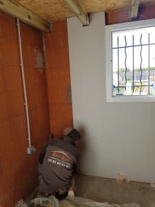 Pose placo isolant aménagement garage